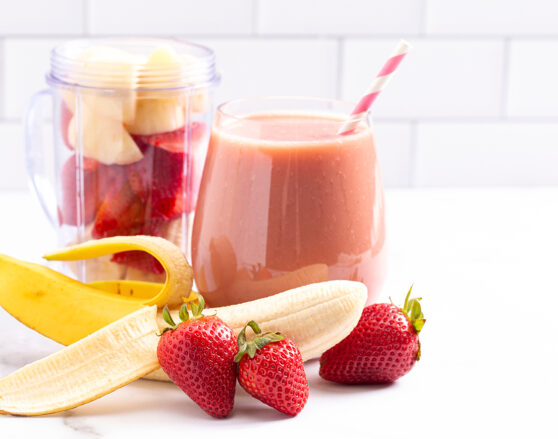 A,Strawberry,Banana,Smoothie,On,A,Bright,White,Kitchen,Cabinet