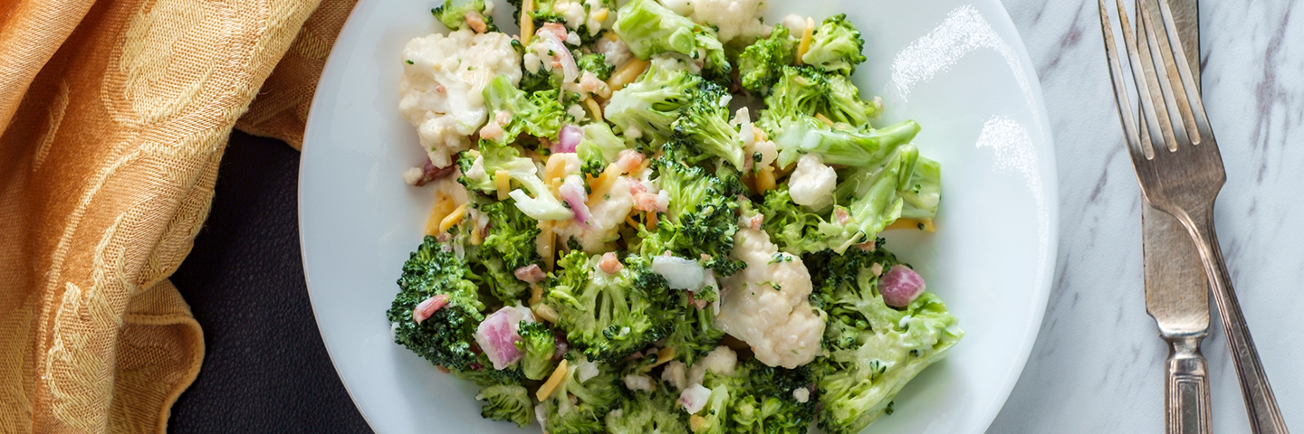 broccoli and cauliflower salad with red onion and cheese