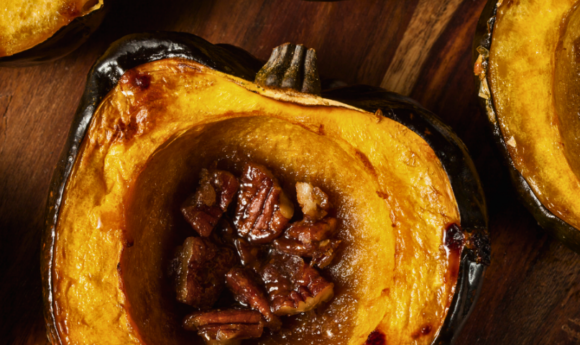 roasted acorn squash with skin on and pecans in center