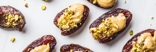 dates stuffed with peanut butter and chopped pistachios