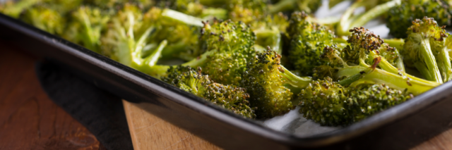 roasted broccoli on a baking sheet pan