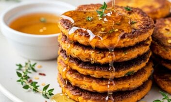 smashed sweetpotatoes with a drizzle of spicy infused honey and fresh thyme sprig on top