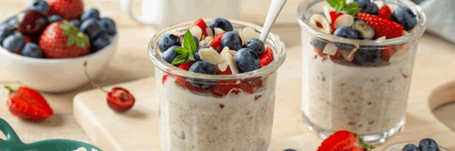 overnight oats topped with strawberries, blueberries and slivered almonds